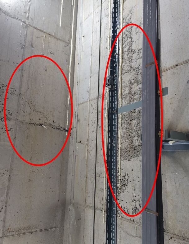 ▲ 엘리베이터 내부 콘크리트 재료분리(우측 원안)와 벽체 철근 노출(좌측 원안) 등 심각한 하자가 발견 됐다.